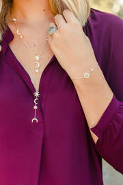 Ashley Childers Celeste Statement Necklace in Gold with moon and star drops